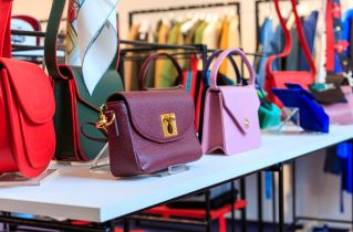 factoring for handbag designers